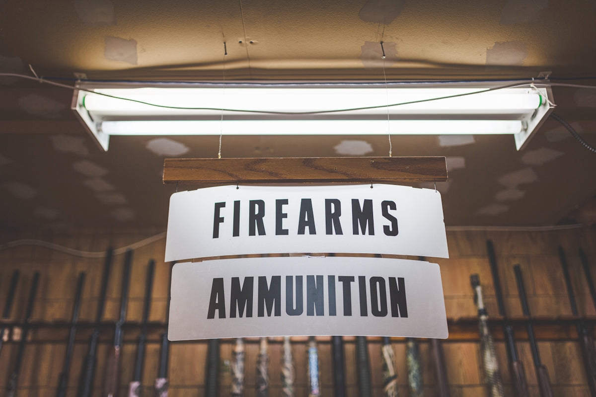 a sign that is hanging from a ceiling