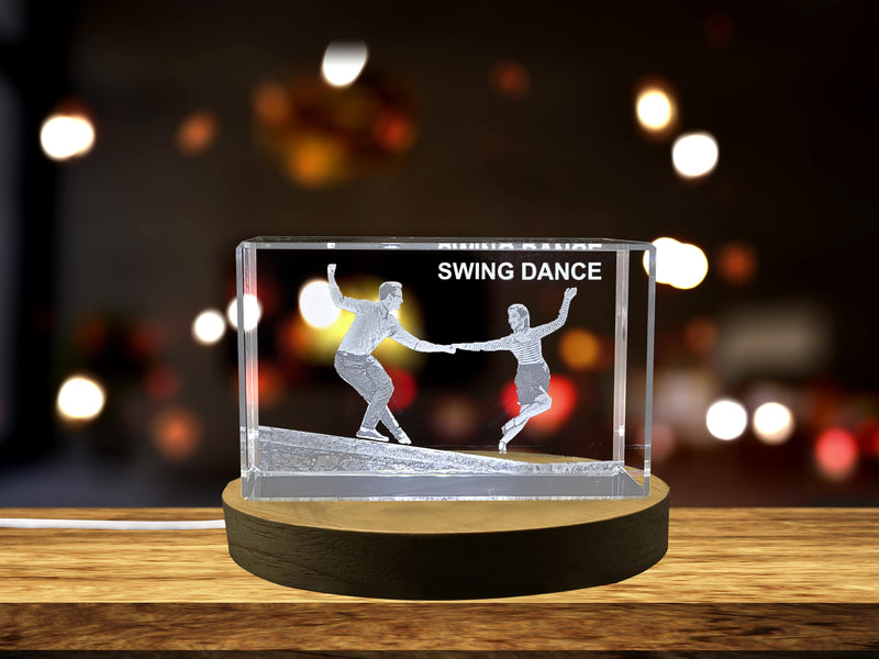 a glass block with a picture of two people dancing