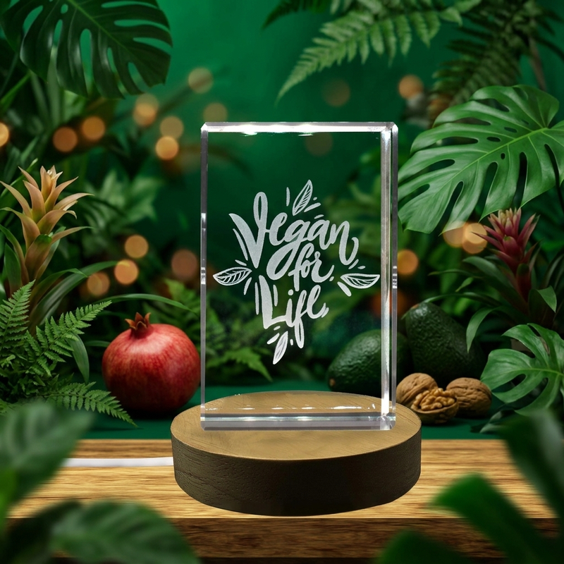 a glass sign that says vegan on it